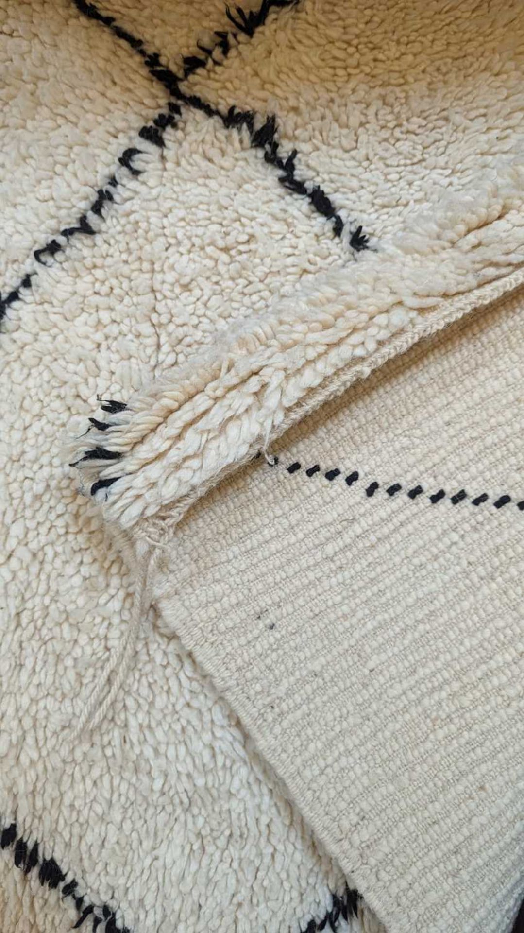 A wool Berber or Beni Ourain rug, - Bild 7 aus 17