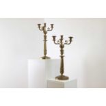 A pair of gilt-metal Empire-style candelabra,