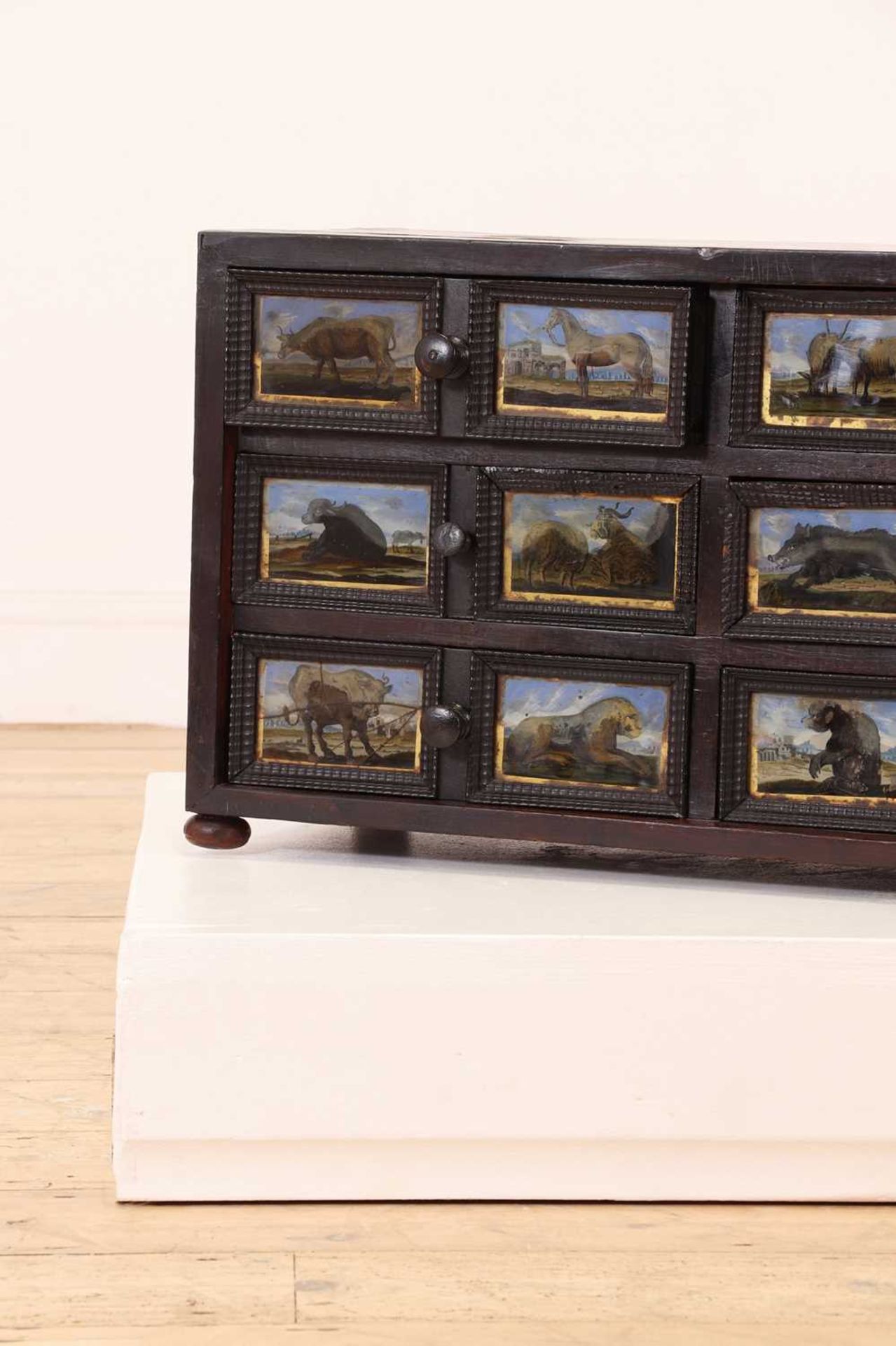 A baroque walnut, ebonised and verre églomisé table cabinet, - Bild 4 aus 28