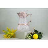 A silver-mounted cut-glass lemonade or water jug,