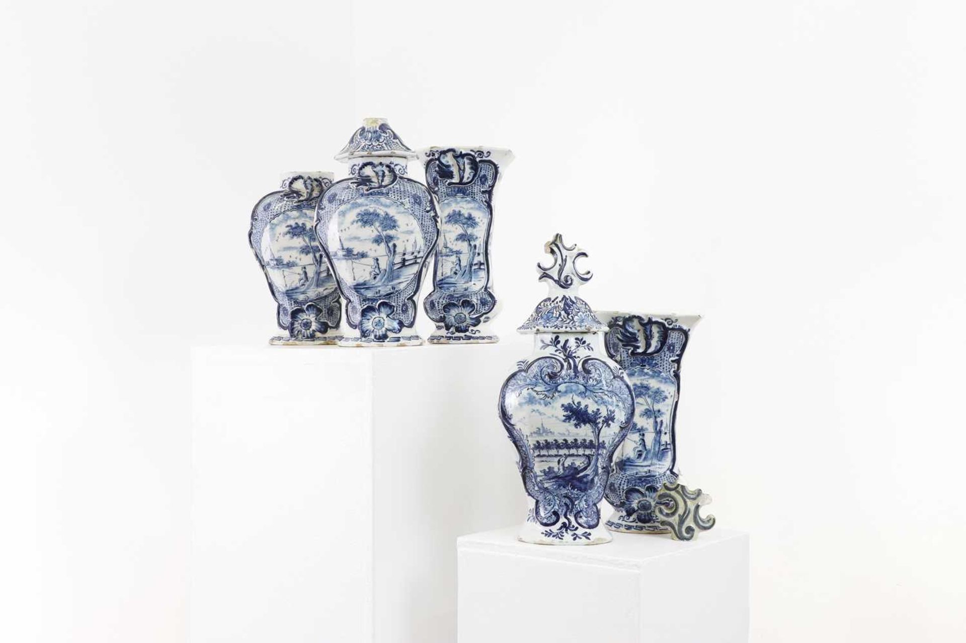 A delft pottery blue and white garniture,