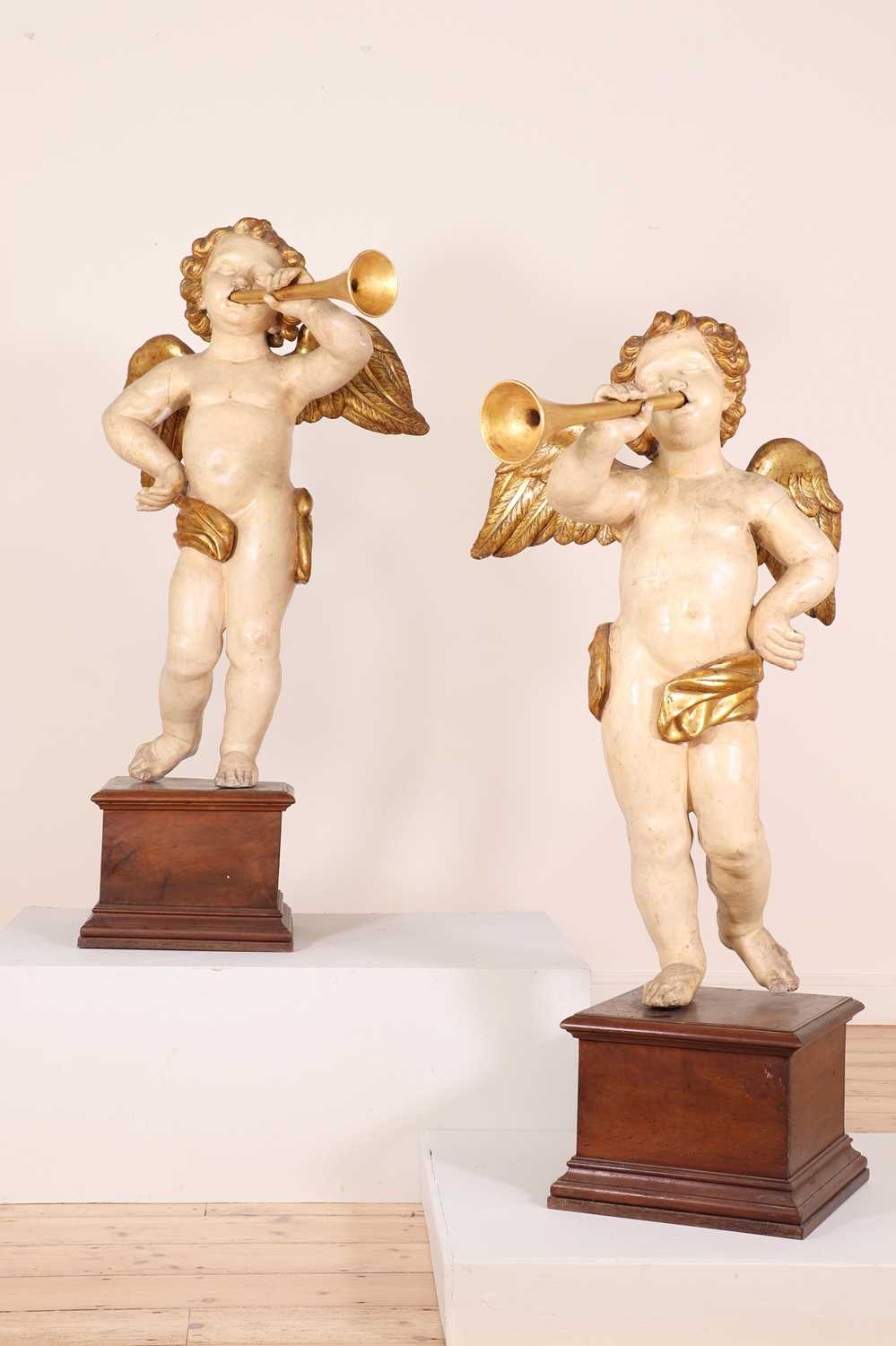 A pair of painted and parcel-gilt wooden putti, - Image 6 of 23