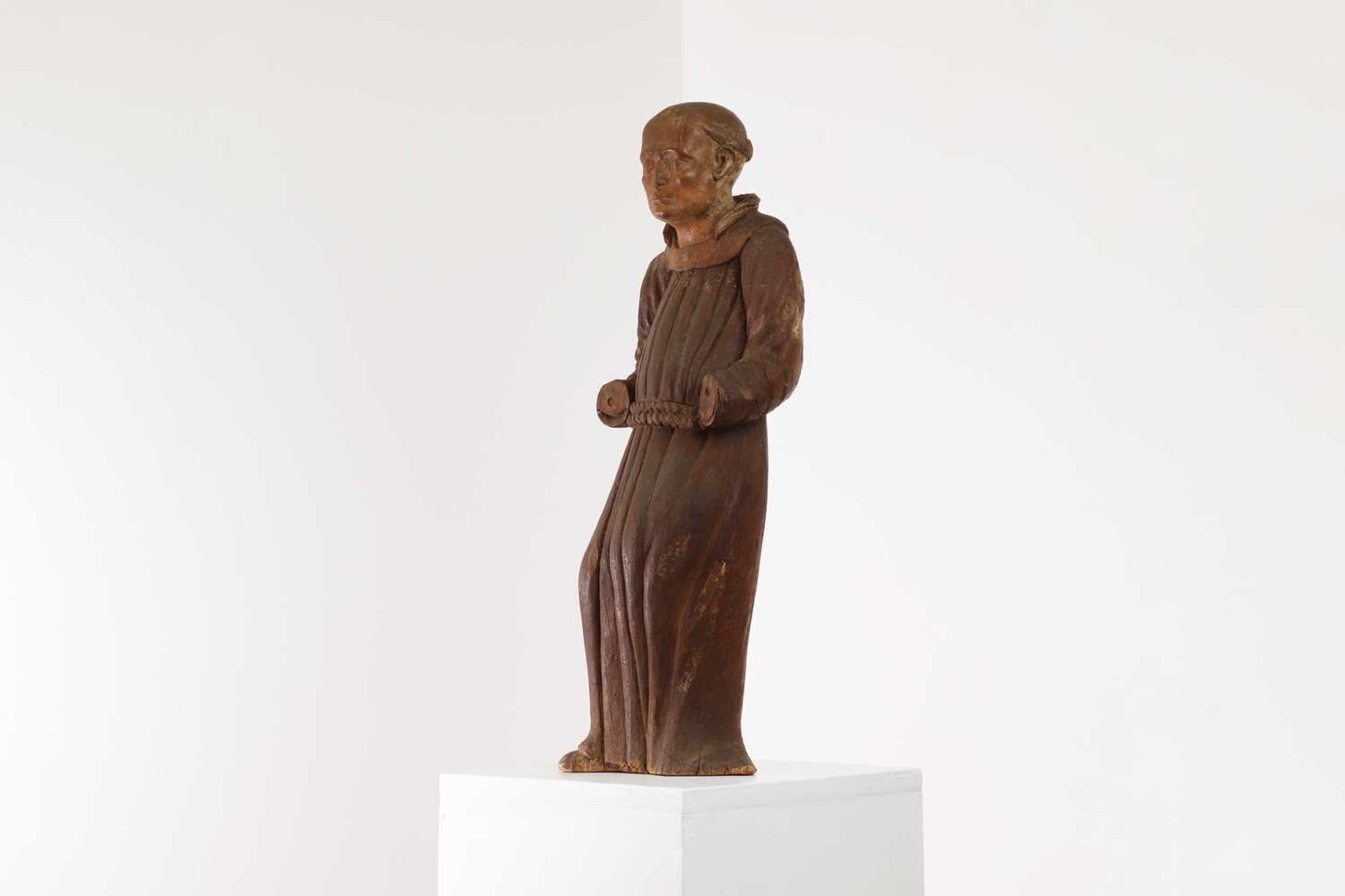 A carved walnut figure of a monk, - Image 6 of 6