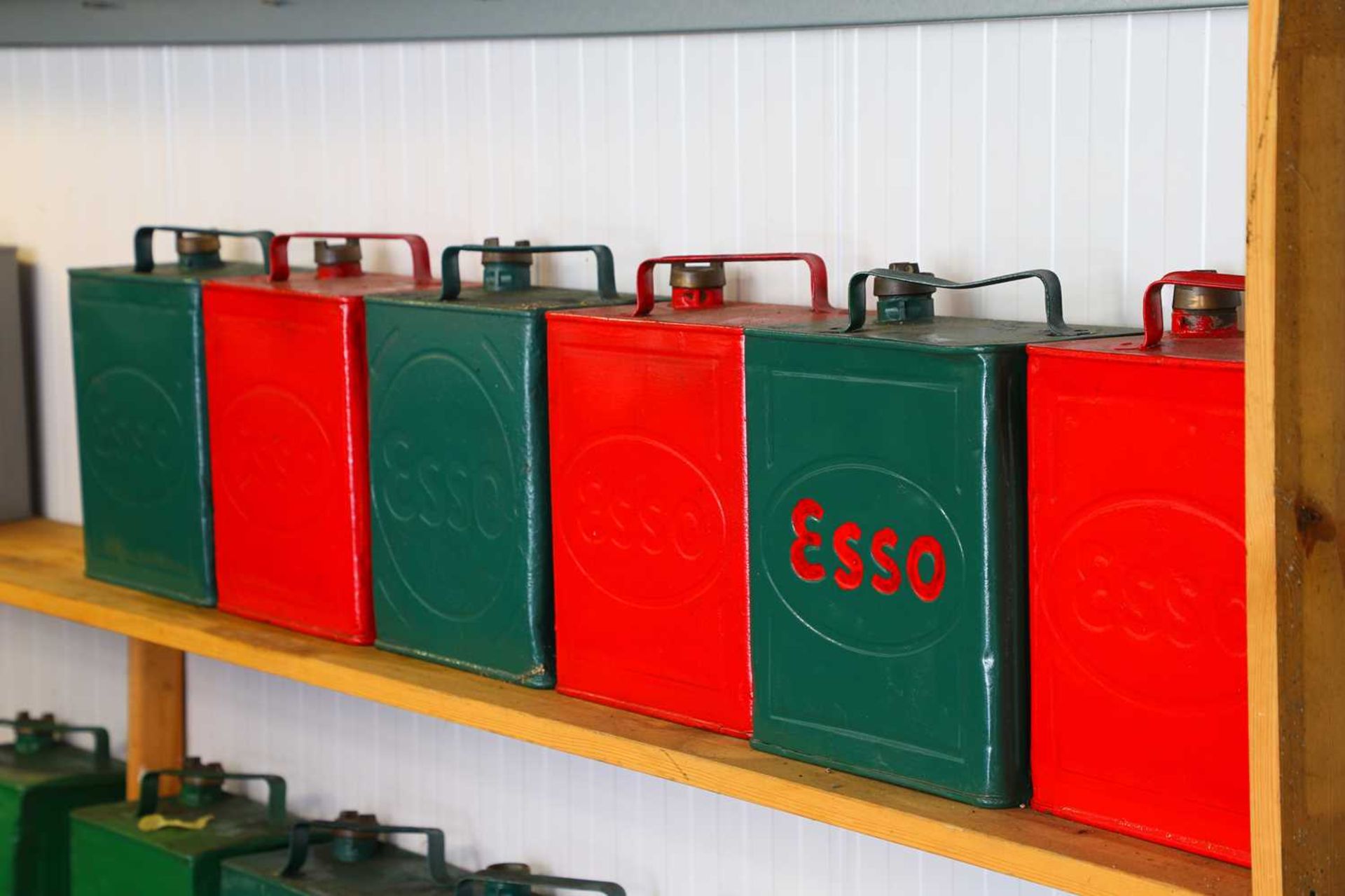 Six Esso two-gallon Valor petrol cans,