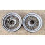 A pair of Invicta spoked steel wheel rims,