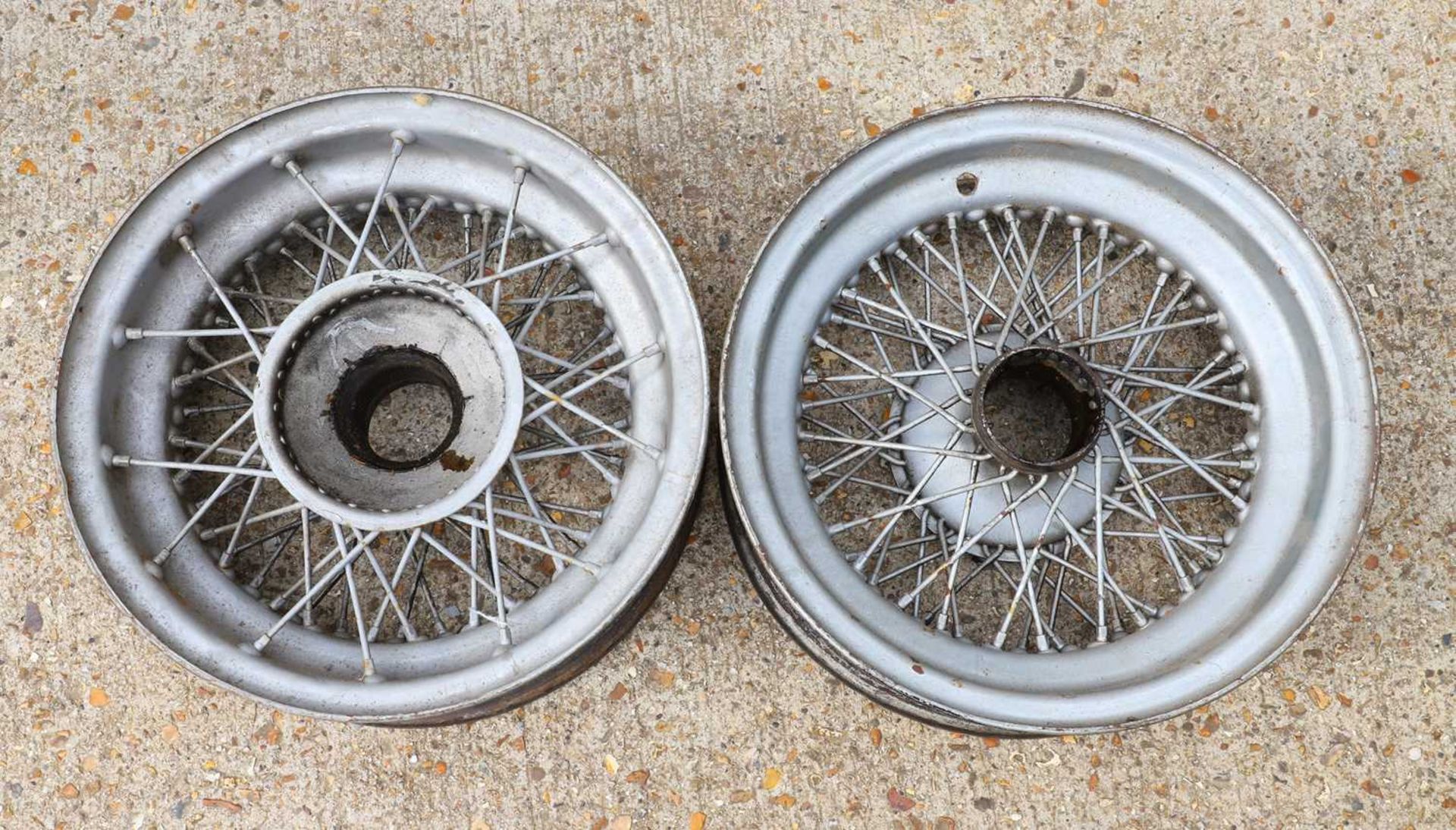 A pair of Invicta spoked steel wheel rims,