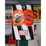 A Duckhams and Morrisol single-sided curved five-colour enamel advertising sign,