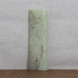 A Chinese pale-green jade wrist rest,