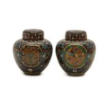 A pair of Japanese cloisonné jars and covers,