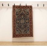 A Persian wool rug