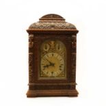 A Victorian oak bracket clock,