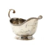 A silver sauce boat