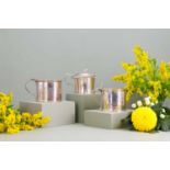 Three silver mustard pots,