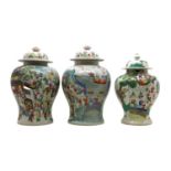 Three Chinese famille rose jars and covers,