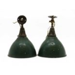 A pair of green Holophane ceiling lights,