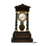 A Victorian ebonised portico clock