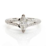 A marquise diamond and 18ct white gold ring,