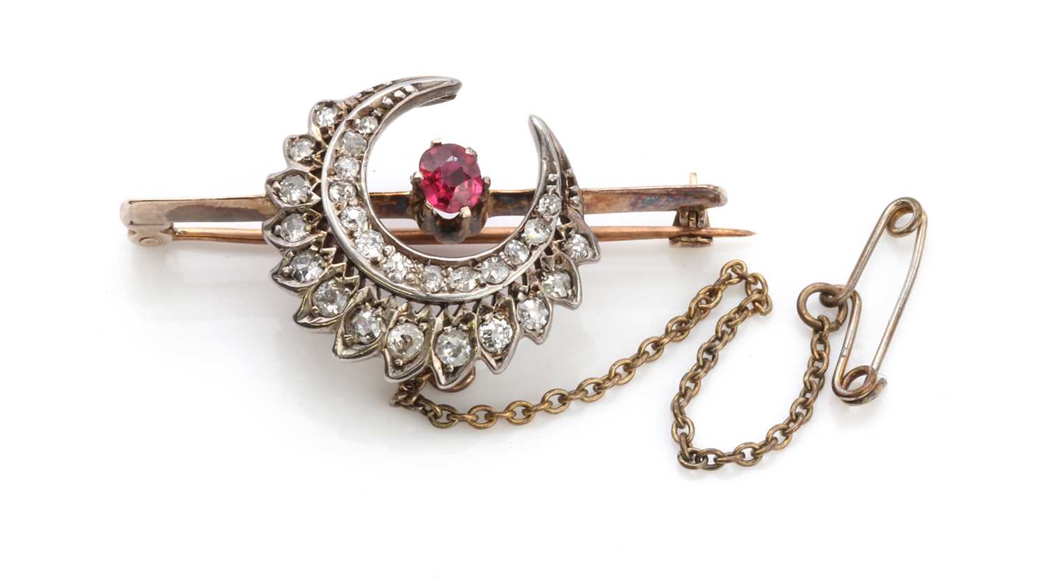 A late Victorian ruby and diamond crescent bar brooch,