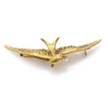 A French Art Nouveau gold and blister pearl swallow brooch,