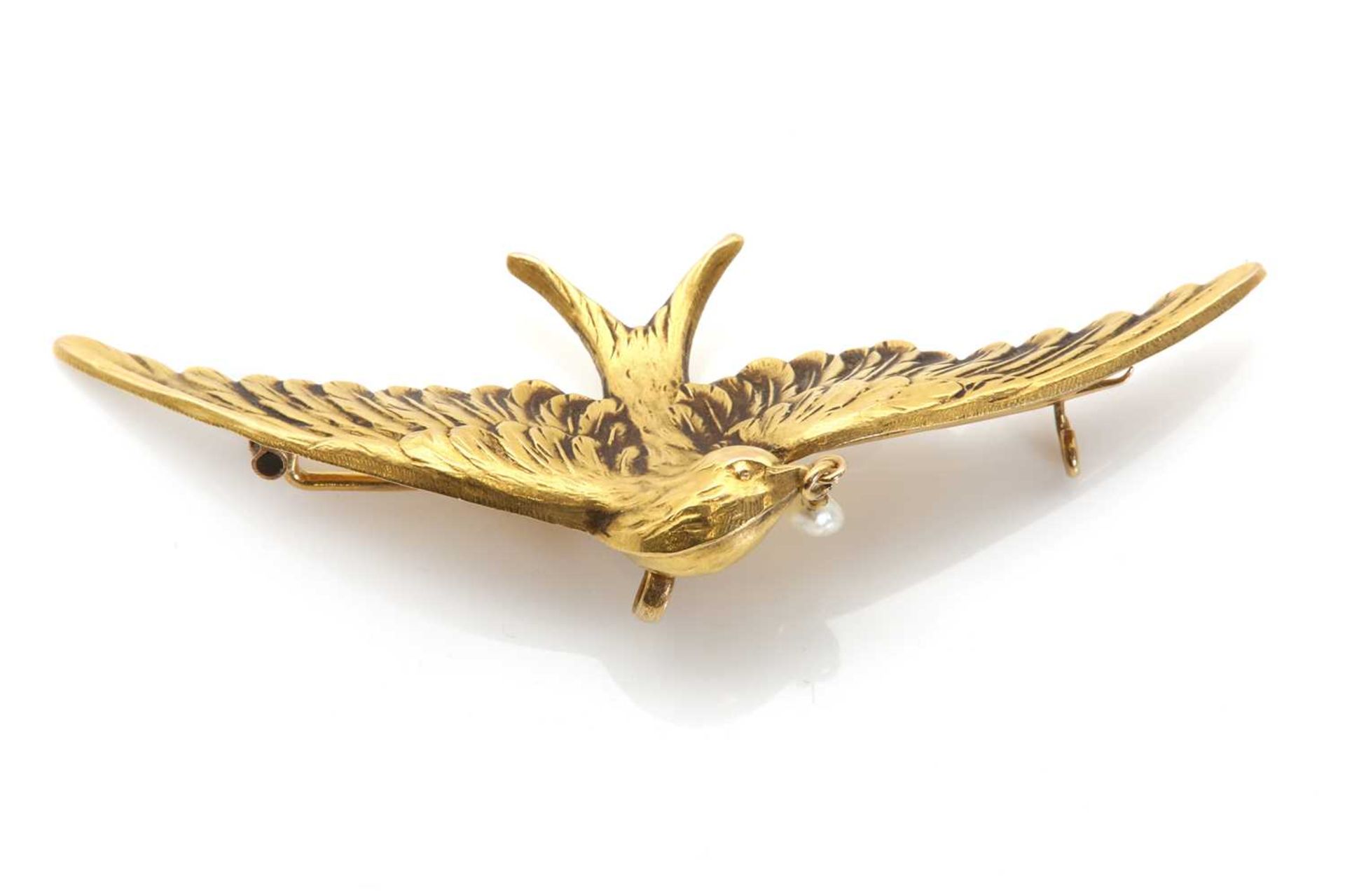 A French Art Nouveau gold and blister pearl swallow brooch,