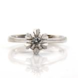 A white gold single stone diamond ring,