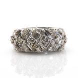 An 18ct white gold diamond set bombé ring,