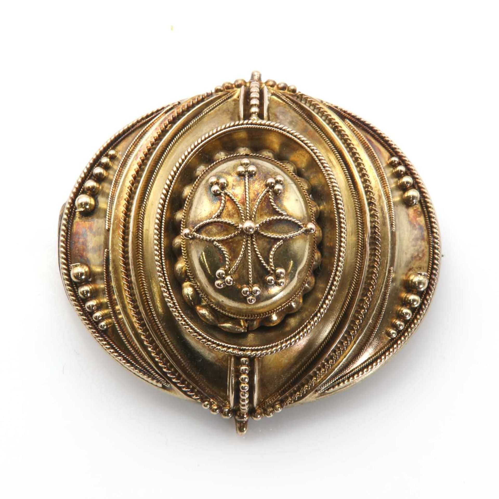 A Victorian archaeological revival style shield brooch,