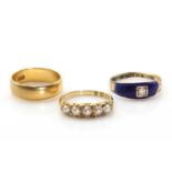 Two Edwardian 18ct gold rings,