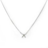 An 18ct white gold diamond set necklace,