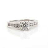 A white gold single stone diamond ring,