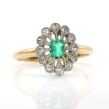 An emerald and diamond oval plaque ring,