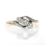 A crossover design three stone diamond ring,