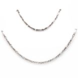 A Danish Modernist silver necklace and bracelet suite, by Georg Jensen,