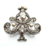 A French paste and graduated faux pearl stomacher brooch/pendant, c.1880,