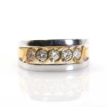 An 18ct two colour gold five stone diamond band ring,