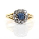 A gold sapphire and diamond cluster ring,