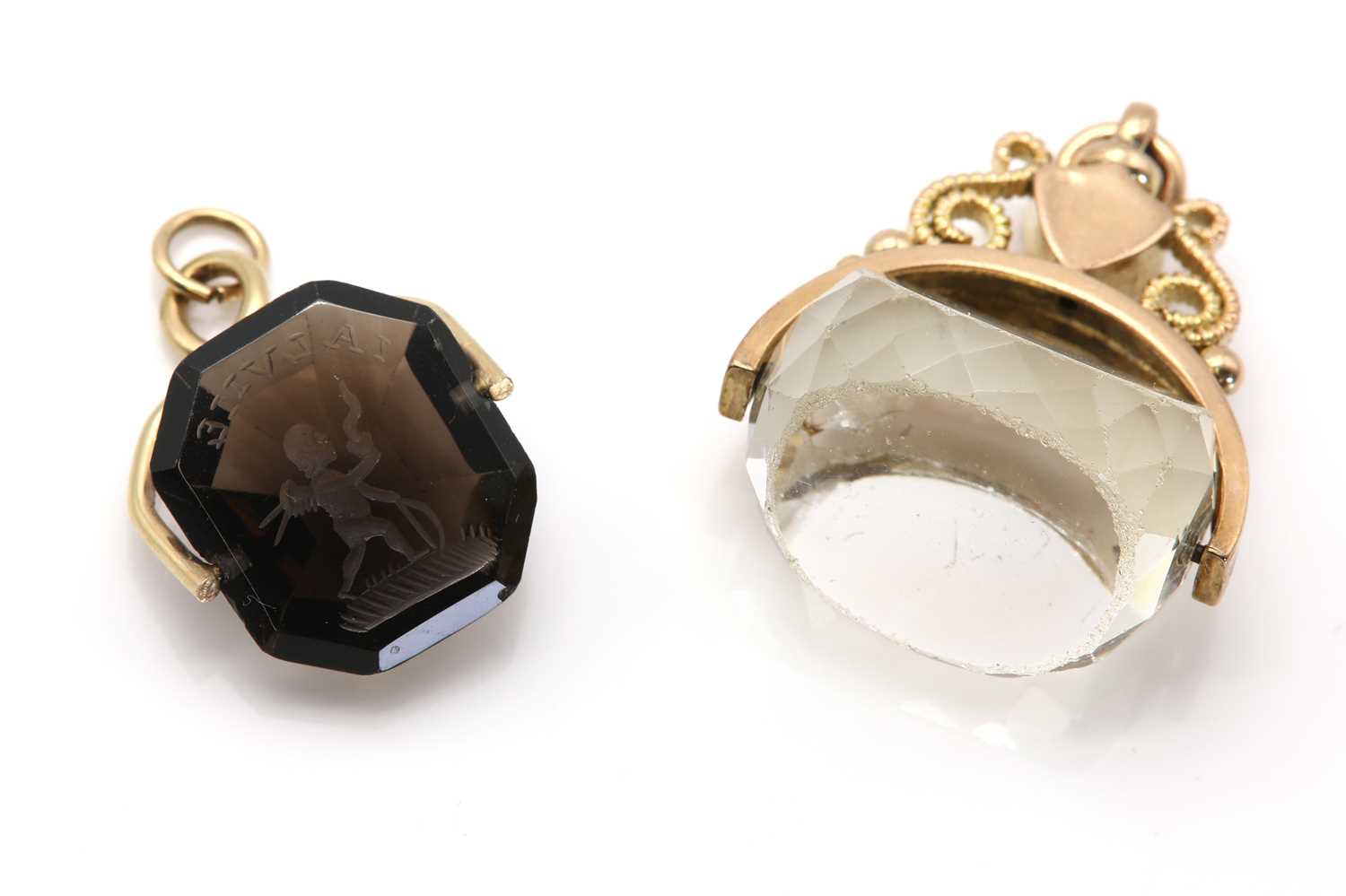 An Edwardian 9ct gold faceted quartz swivel seal, by William Oakley Davies,