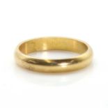 A French 18ct gold wedding band,