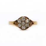 An 18ct gold diamond daisy cluster ring,