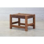 An American Arts and Crafts oak stool,