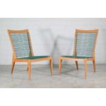 A pair of French birch lounge chairs,