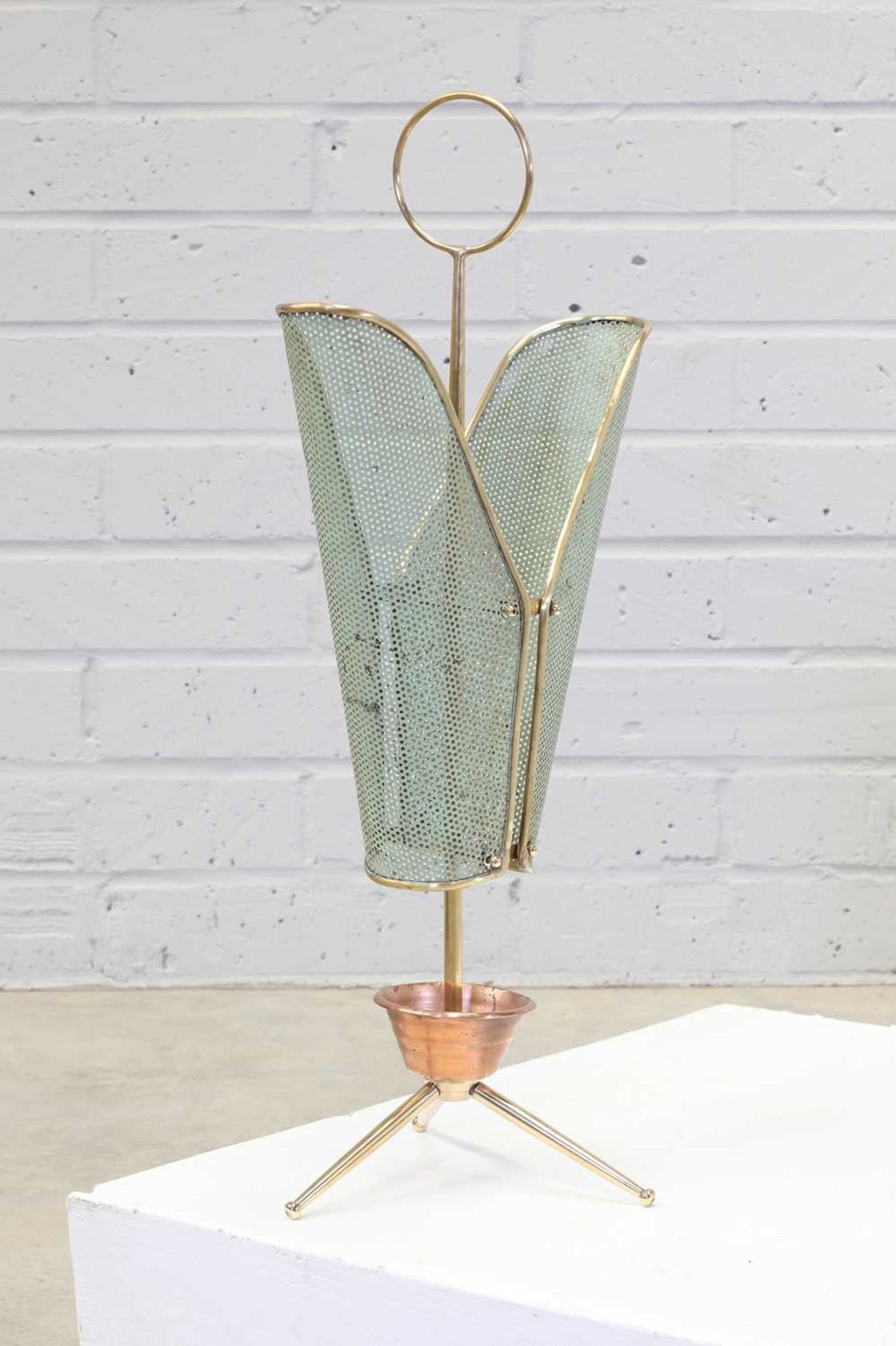 A brass and copper umbrella stand,