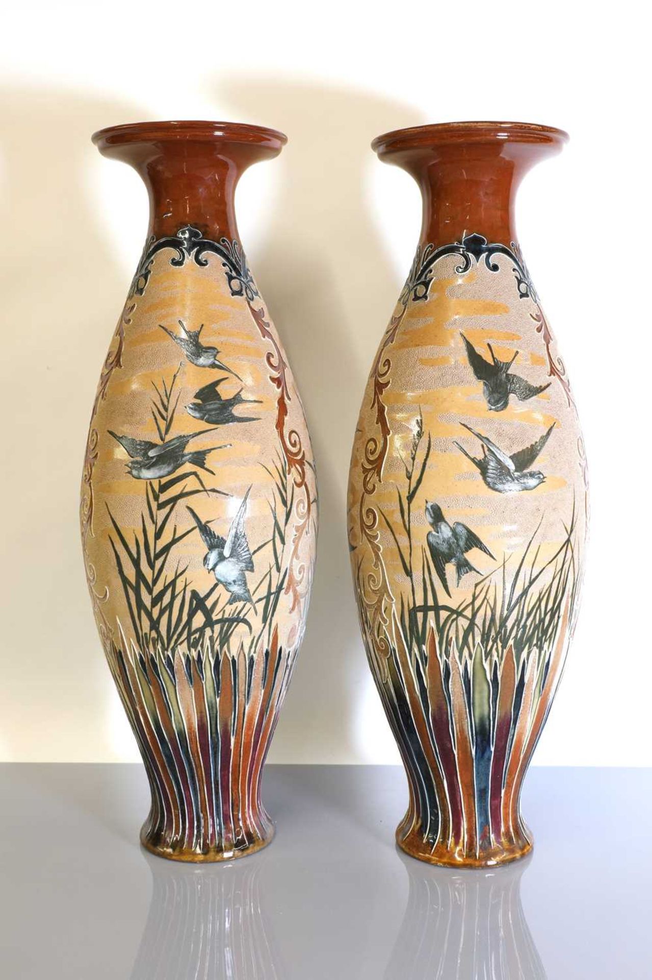 A pair of large Doulton Lambeth stoneware vases,