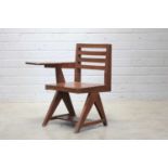 A teak paddle armchair,