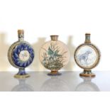 Three Doulton Lambeth stoneware moon flasks,