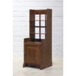 An Arts and Crafts walnut bedside table,