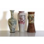 Three Doulton Lambeth and Royal Doulton stoneware vases,