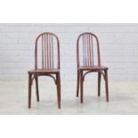 A pair of Czech 'Model 639' dining chairs,