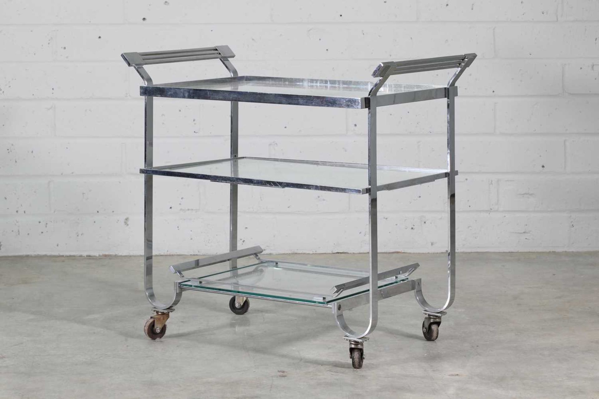 An American chrome and glass bar cart,