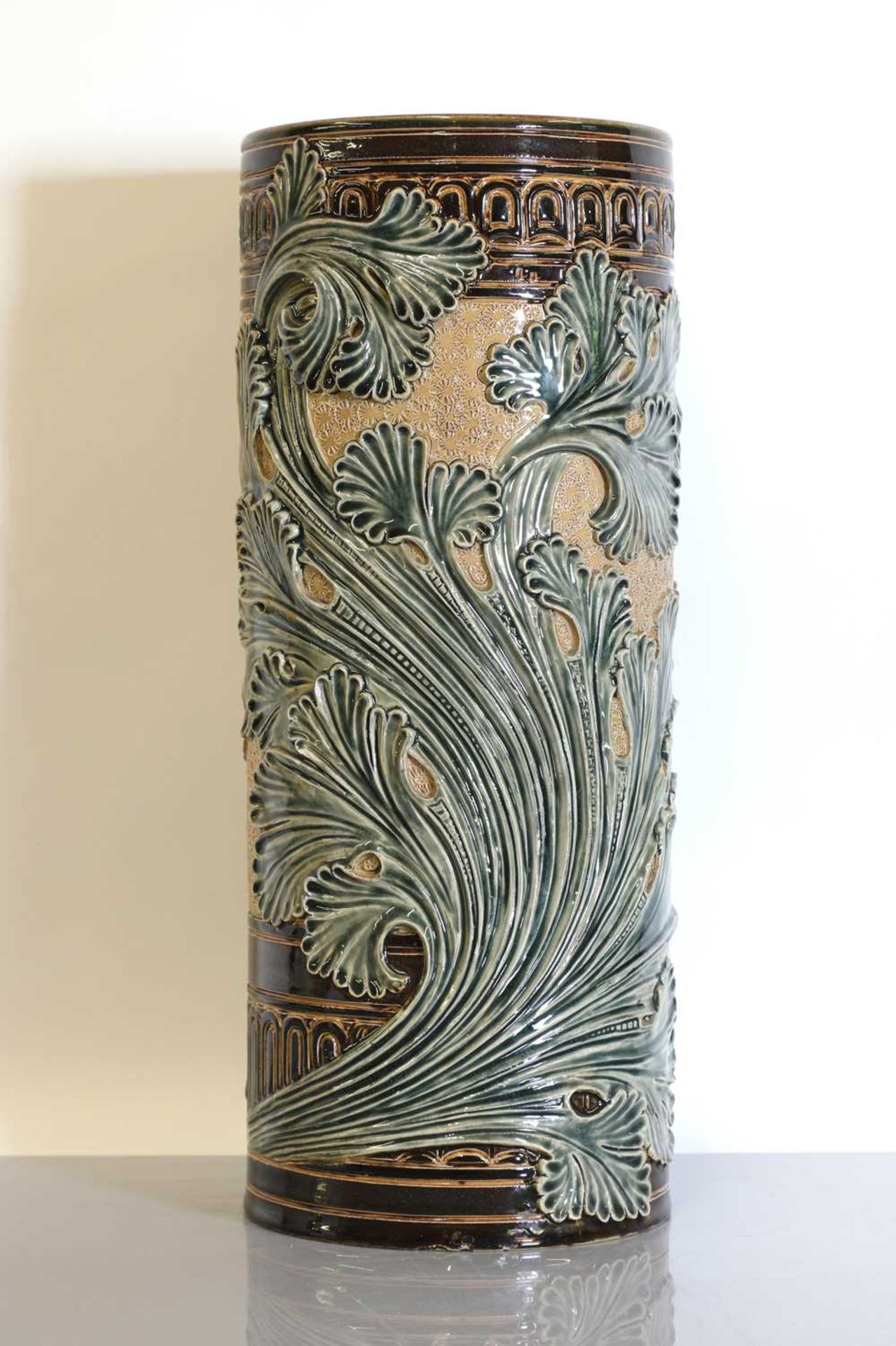 A Doulton stoneware cylindrical vase,